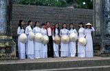 The ao dai (Vietnamese: áo dài) is a Vietnamese national costume, now most commonly for women. In its current form, it is a tight-fitting silk tunic worn over pantaloons. The word is pronounced ow-zye in the north and ow-yai in the south, and translates as 'long dress'.<br/><br/>The name áo dài was originally applied to the dress worn at the court of the Nguyễn Lords at Huế in the 18th century. This outfit evolved into the áo ngũ thân, a five-paneled aristocratic gown worn in the 19th and early 20th centuries. Inspired by Paris fashions, Nguyễn Cát Tường and other artists associated with Hanoi University redesigned the ngũ thân as a modern dress in the 1920s and 1930s.<br/><br/>Elvis Phương, real name Phạm Ngọc Phương (born Thủ Dầu Một 1945) is a Vietnamese popular singer and was one of the first Viet Kieu (Việt Kiều or overseas Vietnamese) to return to Vietnam.