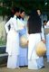 The ao dai (Vietnamese: áo dài) is a Vietnamese national costume, now most commonly for women. In its current form, it is a tight-fitting silk tunic worn over pantaloons. The word is pronounced ow-zye in the north and ow-yai in the south, and translates as 'long dress'.<br/><br/>The name áo dài was originally applied to the dress worn at the court of the Nguyễn Lords at Huế in the 18th century. This outfit evolved into the áo ngũ thân, a five-paneled aristocratic gown worn in the 19th and early 20th centuries. Inspired by Paris fashions, Nguyễn Cát Tường and other artists associated with Hanoi University redesigned the ngũ thân as a modern dress in the 1920s and 1930s.